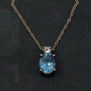 Elegant Blue and Gold Pendant Necklace